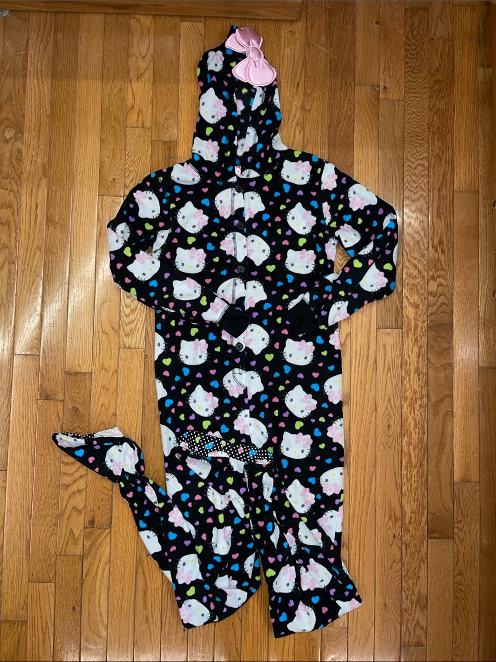 Hello Kitty Black Fleece Hooded Pajama Onesie with Pink Bow Accents